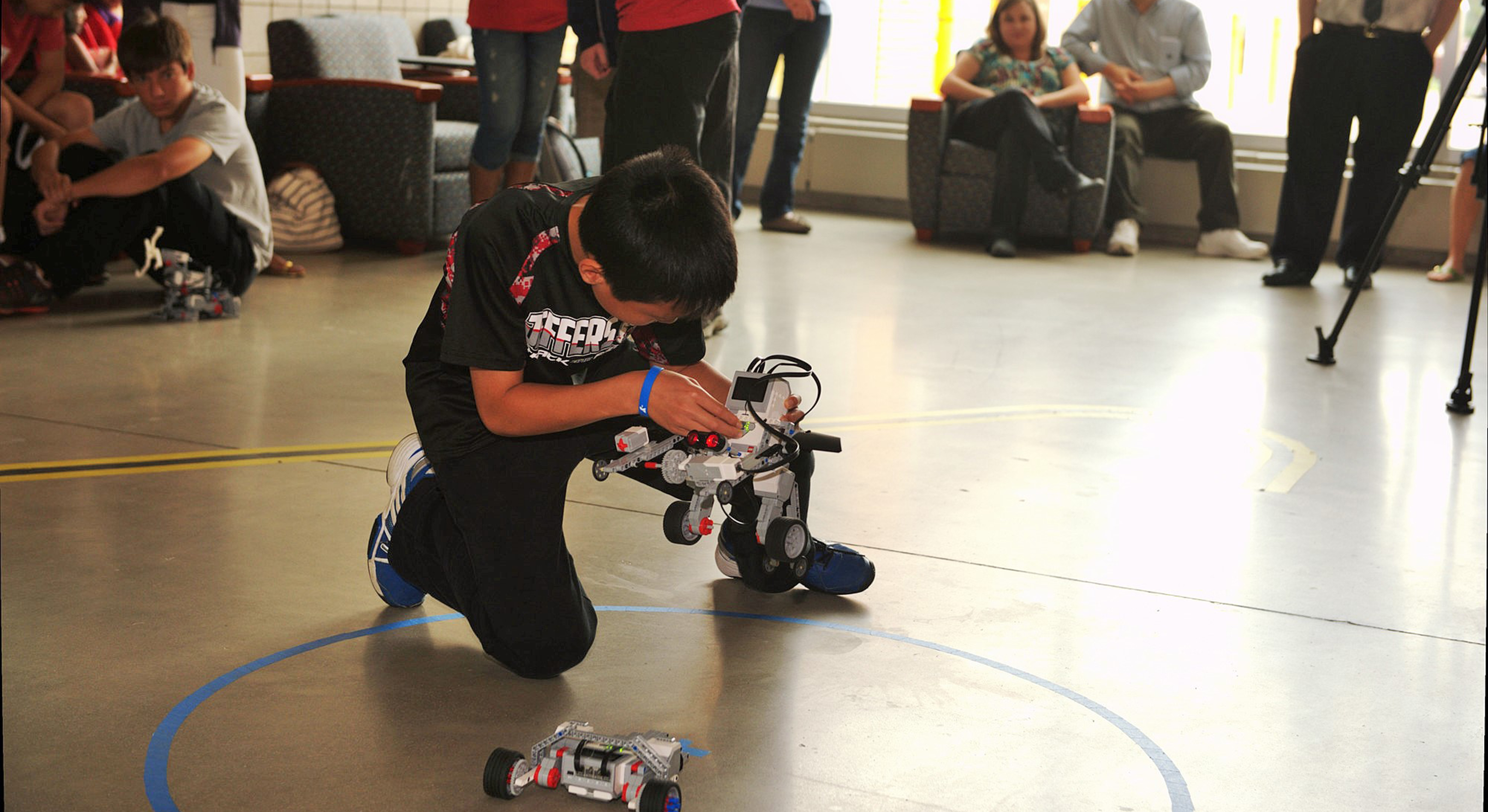 Student fixes self-made robot